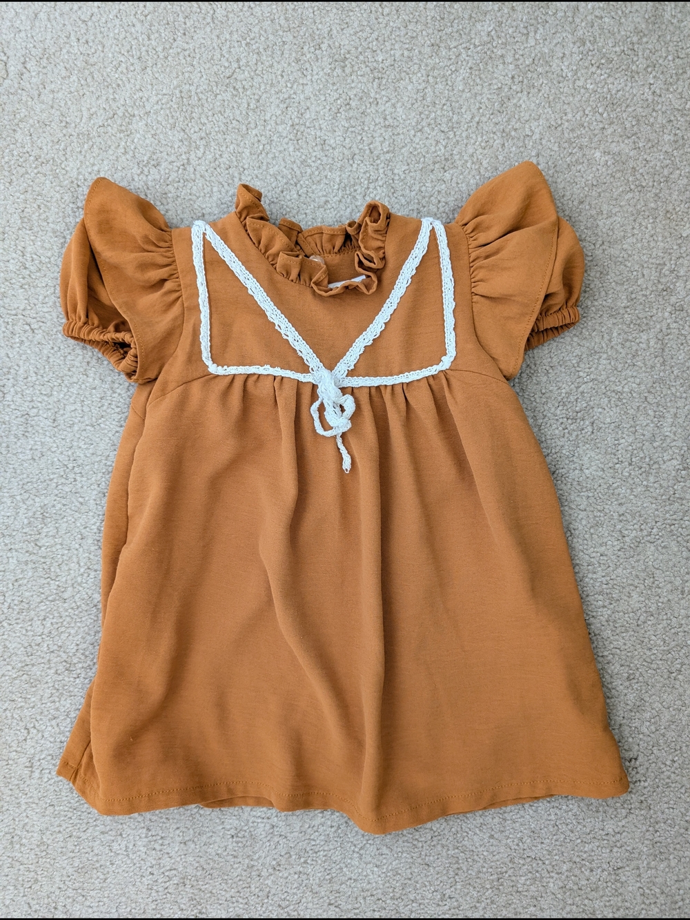 Nueces Rust Orange Baby Dress with White Lace Trim